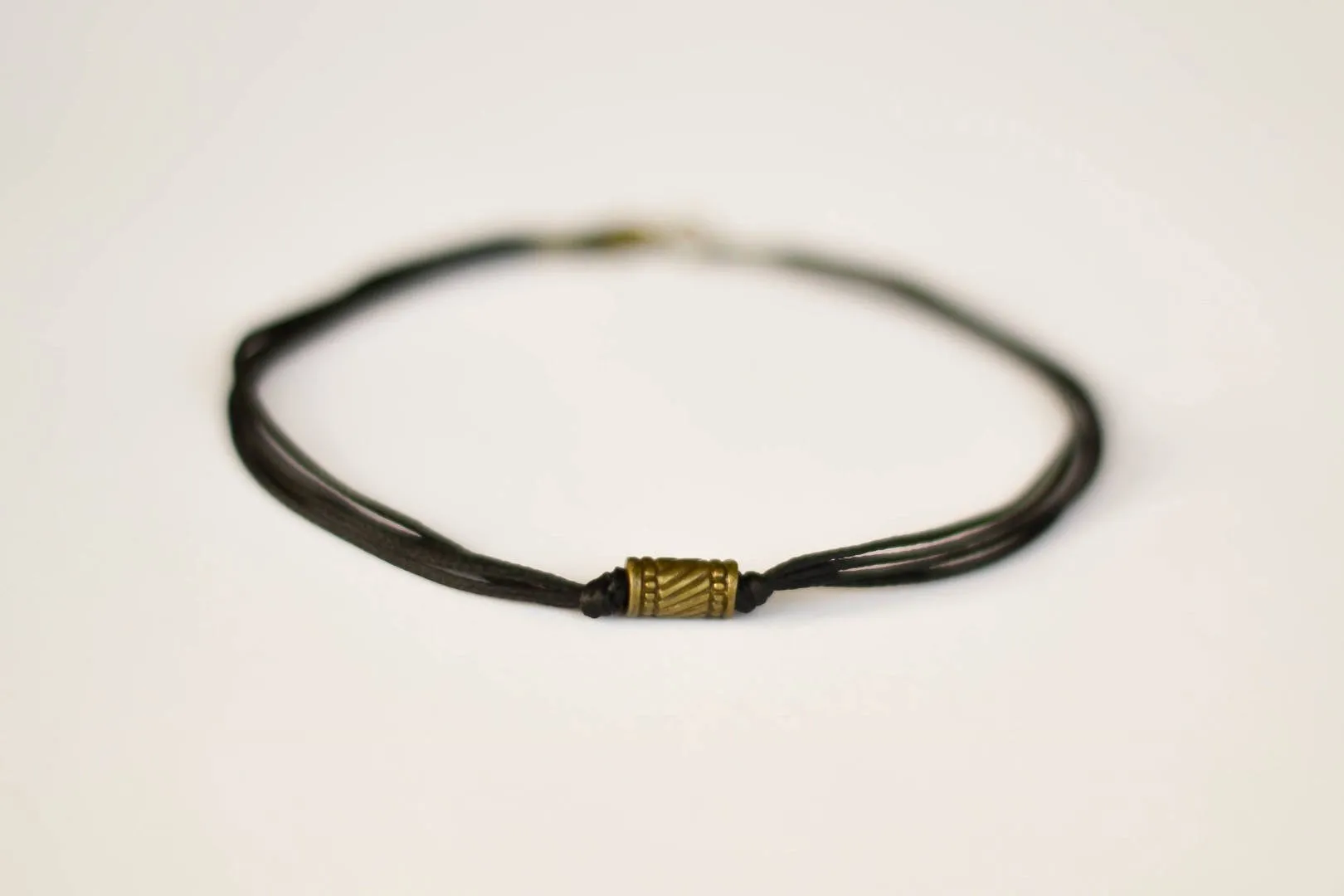 Bronze tube bead anklet for men, black cord, gift for him, yoga jewelry