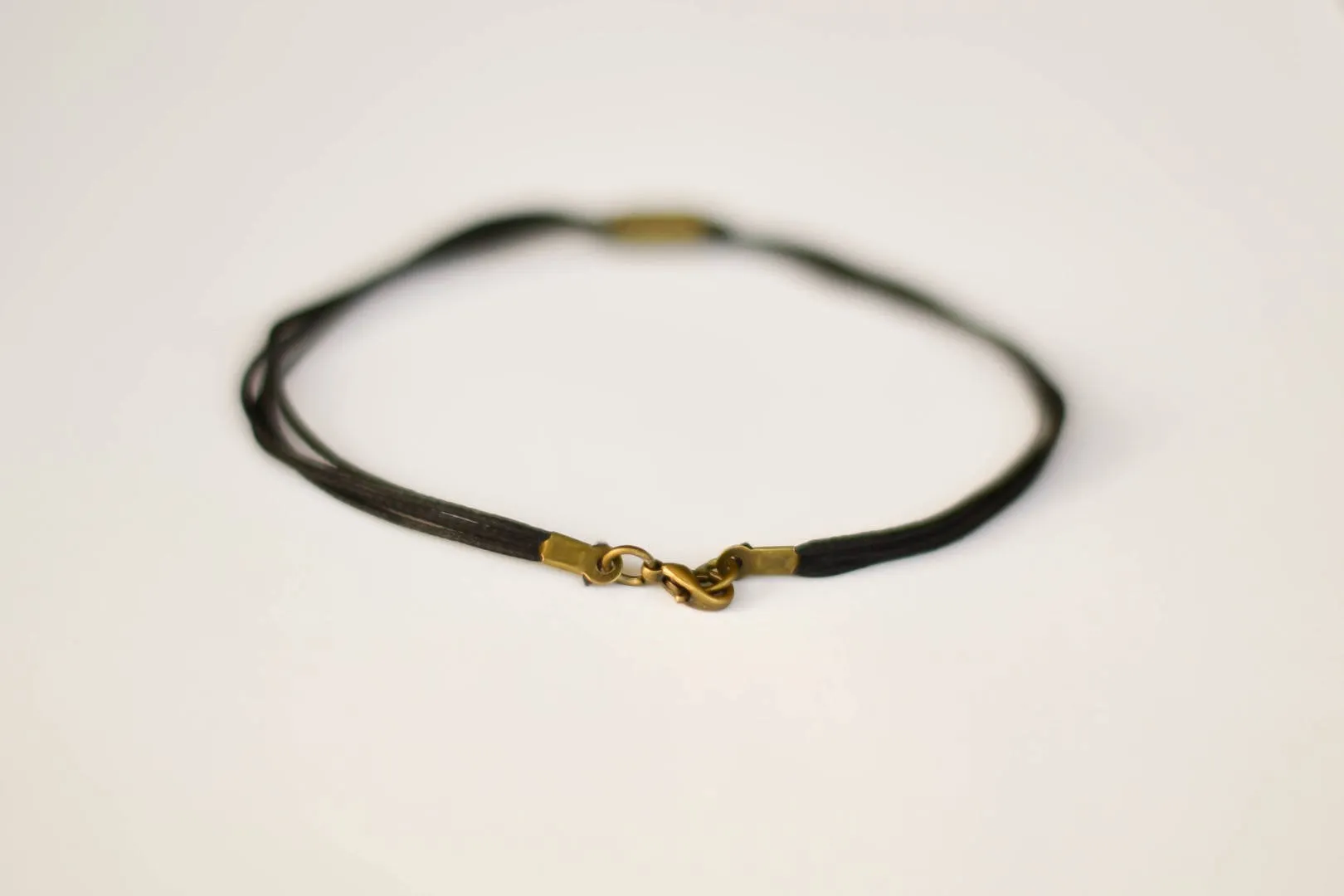 Bronze tube bead anklet for men, black cord, gift for him, yoga jewelry