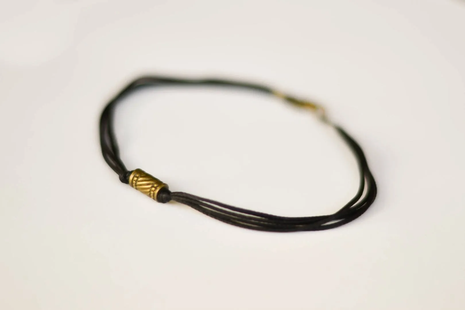 Bronze tube bead anklet for men, black cord, gift for him, yoga jewelry