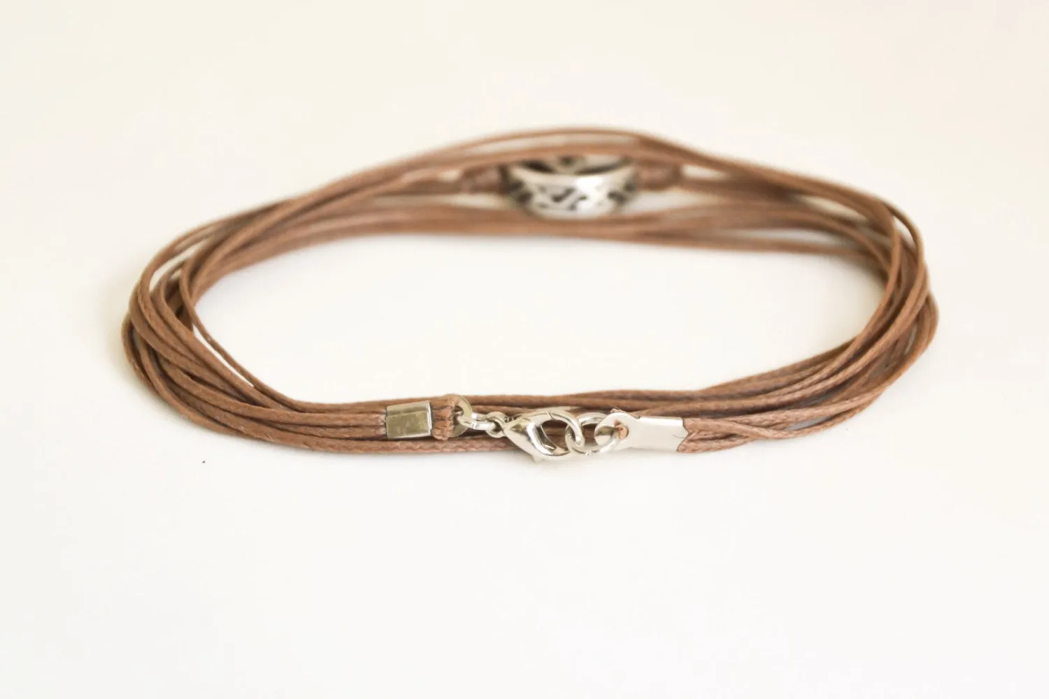 Silver circle wrapped bracelet for men, brown cord